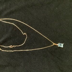 14k solid gold chain with blue topaz  and gold pendant